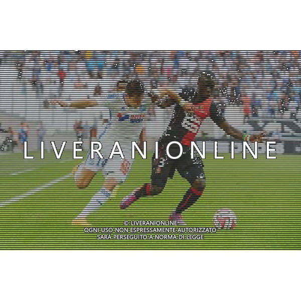 Florian THAUVIN / Cheik MBENGUE - 20.09.2014 - Marseille / Rennes - 6eme journee de Ligue 1 - Photo : Gaston Petrelli / Icon Sport /Agenzia Aldo Liverani sas - ITALY ONLY - EDITORIAL USE ONLY - RUGBY