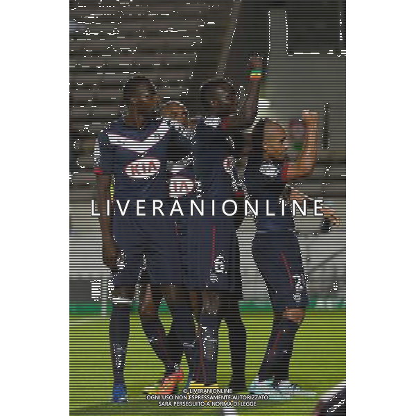 Joie Lamine Sane / Cheick Diabate / Wahbi Khazri - 19.09.2014 - Bordeaux / Evian Thonon - 6e journee Ligue 1 Photo : Thierry Bernard / Icon Sport /Agenzia Aldo Liverani sas - ITALY ONLY - EDITORIAL USE ONLY - RUGBY