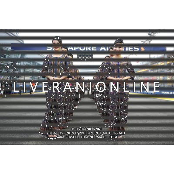 Grid girls on the drivers parade. 21.09.2014. Formula 1 World Championship, Rd 14, Singapore Grand Prix, Singapore, Singapore, Race Day. AG ALDO LIVERANI SAS ONLY ITALY