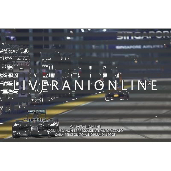 Lewis Hamilton (GBR) Mercedes AMG F1 W05. 21.09.2014. Formula 1 World Championship, Rd 14, Singapore Grand Prix, Singapore, Singapore, Race Day. AG ALDO LIVERANI SAS ONLY ITALY