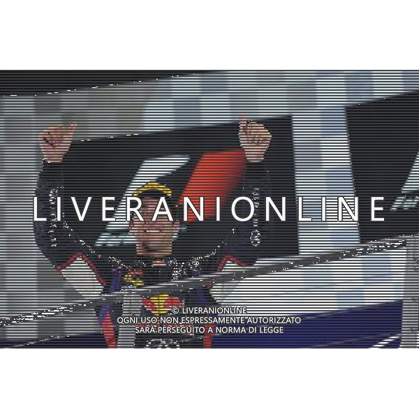 Daniel Ricciardo (AUS) Red Bull Racing celebrates his third position on the podium. 21.09.2014. Formula 1 World Championship, Rd 14, Singapore Grand Prix, Singapore, Singapore, Race Day. AG ALDO LIVERANI SAS ONLY ITALY