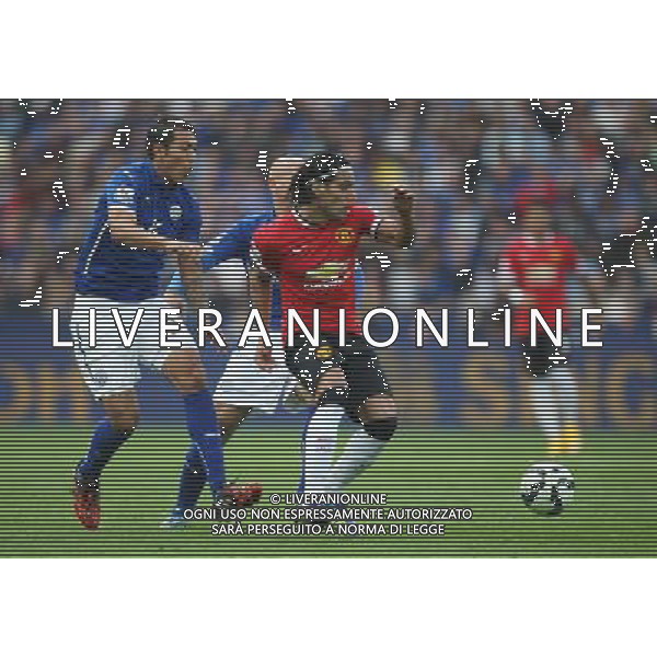 Manchester United\'s Radamel Falcao Garcia (R) and Leicester City\'s Leonardo Ulloa in action during todays match Photographer Jack Phillips/CameraSport Football - Barclays Premiership - Leicester City v Manchester United - Sunday 21st September 2014 - King Power Stadium - Leicester © CameraSport - 43 Linden Ave. Countesthorpe. Leicester. England. LE8 5PG - Tel: +44 (0) 116 277 4147 - admin@camerasport.com - www.camerasport.com AG ALDO LIVERANI SAS ONLY ITALY