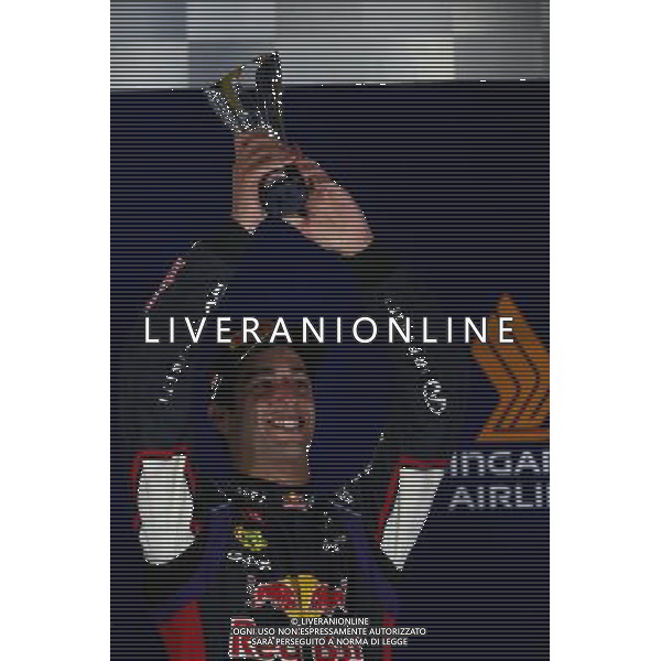 3rd place Daniel Ricciardo (AUS) Red Bull Racing RB10. 21.09.2014. Formula 1 World Championship, Rd 14, Singapore Grand Prix, Singapore, Singapore, Race Day. AG ALDO LIVERANI SAS ONLY ITALY