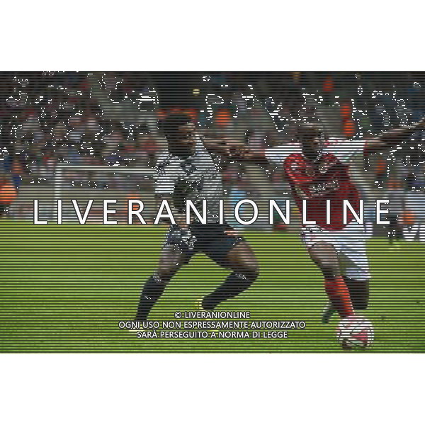 Brice DJA DJEDJE / Chris MAVINGA - 23.09.2014 - Reims / Marseille - 7eme journee de Ligue 1 - Photo : Gaston Petrelli / Icon Sport /Agenzia Aldo Liverani sas - ITALY ONLY - EDITORIAL USE ONLY