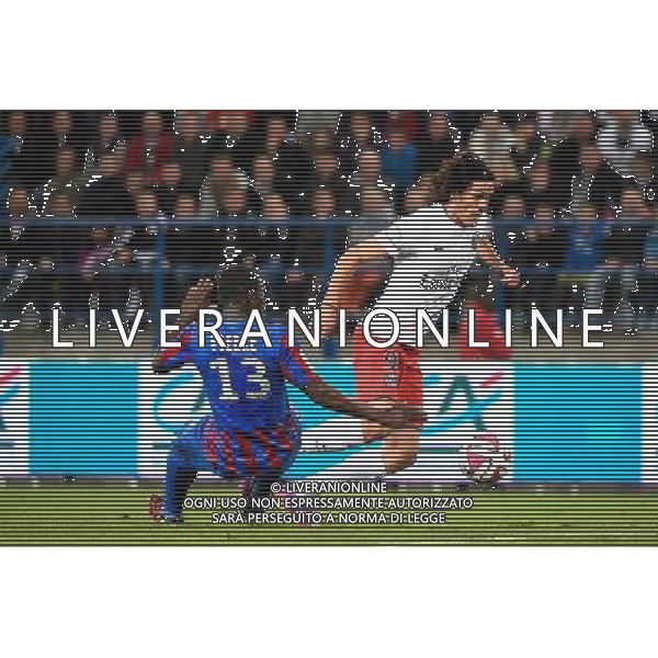 Edinson CAVANI / Jean Jacques PIERRE - 24.09.2014 - Caen / PSG - 7eme journee de Ligue 1 Photo : Fred Porcu / Icon Sport AG ALDO LIVERANI SAS ONLY ITALY