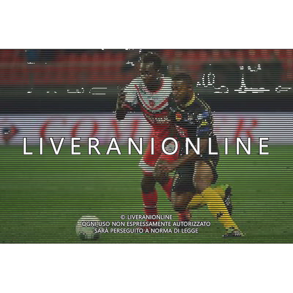 Luigi GLOMBARD / Abdoul Aziz KABORE - 26.09.2014 - Valenciennes / Orleans - 9eme journee de Ligue 2 Photo : Dave Winter / Icon Sport /Agenzia Aldo Liverani sas - ITALY ONLY - EDITORIAL USE ONLY