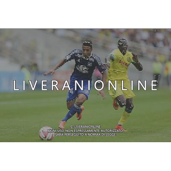 Corentin TOLISSO / Issa CISSOKHO - 28.09.2014 - Nantes / Lyon - 8eme journee de Ligue 1 Photo : Vincent Michel / Icon Sport AG ALDO LIVERANI SAS ONLY ITALY