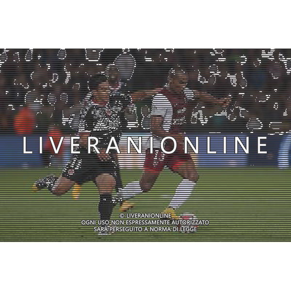 Diego RIGONATO RODRIGUES / Florent MALOUDA - 27.09.2014 - Metz / Reims - 8eme journee de Ligue 1 Photo : Fred Marvaux / Icon Sport /Agenzia Aldo Liverani sas - ITALY ONLY - EDITORIAL USE ONLY
