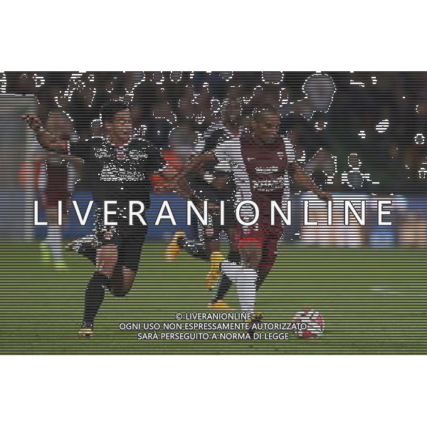 Diego RIGONATO RODRIGUES / Florent MALOUDA - 27.09.2014 - Metz / Reims - 8eme journee de Ligue 1 Photo : Fred Marvaux / Icon Sport /Agenzia Aldo Liverani sas - ITALY ONLY - EDITORIAL USE ONLY
