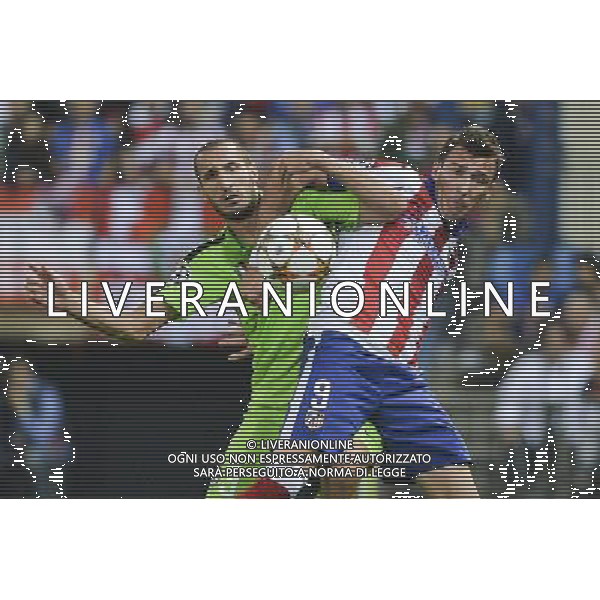 Madrid 1-10-2014 - Estadio Vicente Calder˜n Atletico Madrid vs Juventus - Uefa Champions League 2014-2015 Nella foto: Chiellini , Mandzukic FOTO TARDITO-AG ALDO LIVERANI SAS