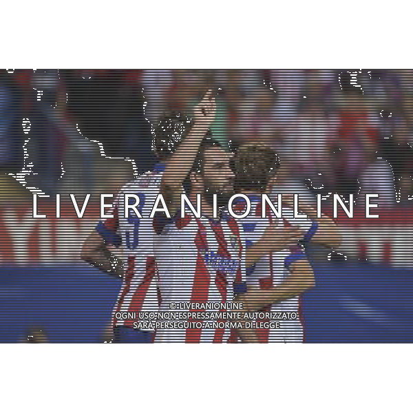 Madrid 1-10-2014 - Estadio Vicente Calder˜n Atletico Madrid vs Juventus - Uefa Champions League 2014-2015 Nella foto: esultanza Arda Turan FOTO TARDITO-AG ALDO LIVERANI SAS