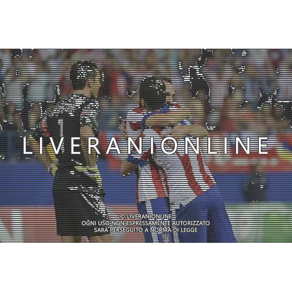 Madrid 1-10-2014 - Estadio Vicente CalderÃ²n Atletico Madrid vs Juventus - Uefa Champions League 2014-2015 Nella foto: esultanza Arda Turan FOTO TARDITO FEDERICO-AG ALDO LIVERANI SAS