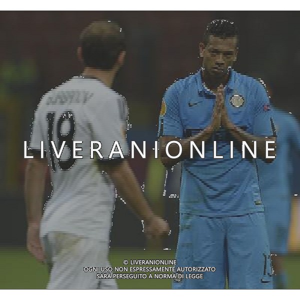 UEFA Europa League 2014/2015 Gruppo F Milano - 02.10.2014 Inter-Qarabag Nella Foto:guarin si scusa con un avversario per aver simulato un fallo /Ph.Vitez-Ag. Aldo Liverani