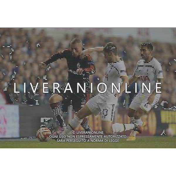 Besiktas\'s Gokhan Tore despite the attentions of Tottenham Hotspur\'s Ben Davies Photographer Kieran Galvin/CameraSport Football - UEFA Europa League Group C - Tottenham Hotspur v Besiktas - Thursday 02nd October 2014 - White Hart Lane - London © CameraSport - 43 Linden Ave. Countesthorpe. Leicester. England. LE8 5PG - Tel: +44 (0) 116 277 4147 - admin@camerasport.com - www.camerasport.com /Agenzia Aldo Liverani sas - ITALY ONLY - EDITORIAL USE ONLY