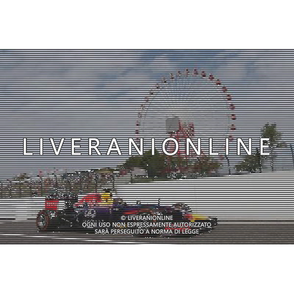 Sebastian Vettel (GER) Red Bull Racing RB10. 03.10.2014. Formula 1 World Championship, Rd 15, Japanese Grand Prix, Suzuka, Japan, Practice Day. AG ALDO LIVERANI SAS ONLY ITALY