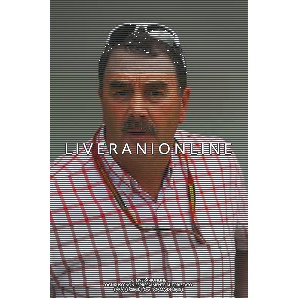 Nigel Mansell (GBR), with his moustache back. 03.10.2014. Formula 1 World Championship, Rd 15, Japanese Grand Prix, Suzuka, Japan, Practice Day. AG ALDO LIVERANI SAS ONLY ITALY
