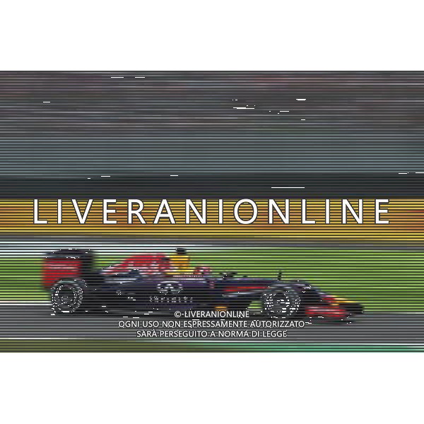 Sebastian Vettel (GER) Red Bull Racing RB10. 03.10.2014. Formula 1 World Championship, Rd 15, Japanese Grand Prix, Suzuka, Japan, Practice Day. AG ALDO LIVERANI SAS ONLY ITALY