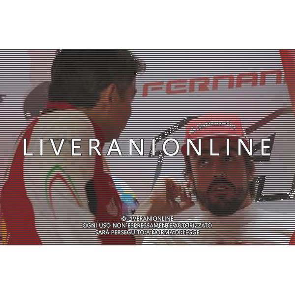 (L to R): Marco Mattiacci (ITA) Ferrari Team Principal with Fernando Alonso (ESP) Ferrari. 04.10.2014. Formula 1 World Championship, Rd 15, Japanese Grand Prix, Suzuka, Japan, Qualifying Day. - www.xpbimages.com, EMail: requests@xpbimages.com - copy of publication required for printed pictures. Every used picture is fee-liable. © Copyright: Moy / XPB Images /Ag. Aldo Liverani s.a.s.-Only Italy-Editorial Use Only