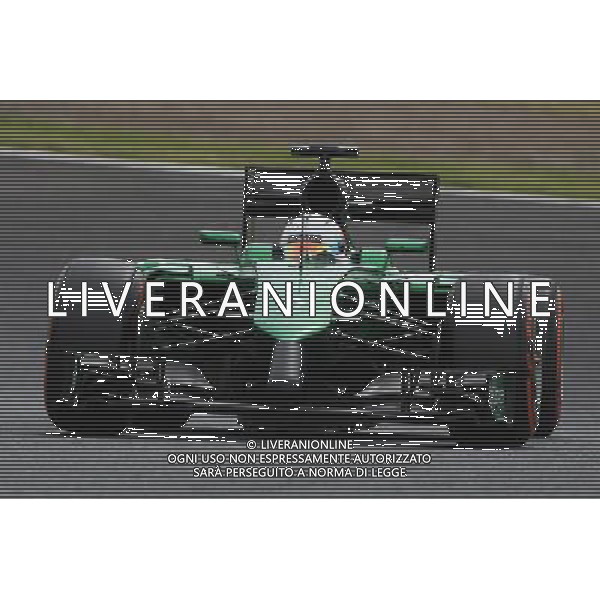 Kamui Kobayashi (JPN) Caterham CT05. 04.10.2014. Formula 1 World Championship, Rd 15, Japanese Grand Prix, Suzuka, Japan, Qualifying Day. - www.xpbimages.com, EMail: requests@xpbimages.com - copy of publication required for printed pictures. Every used picture is fee-liable. © Copyright: Photo4 / XPB Images /Ag. Aldo Liverani s.a.s.-Only Italy-Editorial Use Only