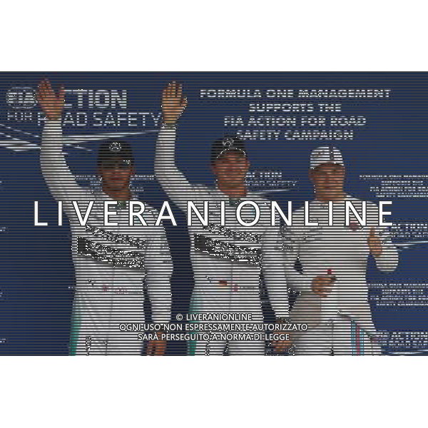 Pole for Nico Rosberg (GER) Mercedes AMG F1 W05, 2nd for Lewis Hamilton (GBR) Mercedes AMG F1 W05 and 3rd for Valtteri Bottas (FIN) Williams FW36. 04.10.2014. Formula 1 World Championship, Rd 15, Japanese Grand Prix, Suzuka, Japan, Qualifying Day. - www.xpbimages.com, EMail: requests@xpbimages.com - copy of publication required for printed pictures. Every used picture is fee-liable. © Copyright: Batchelor / XPB Images /Ag. Aldo Liverani s.a.s.-Only Italy-Editorial Use Only