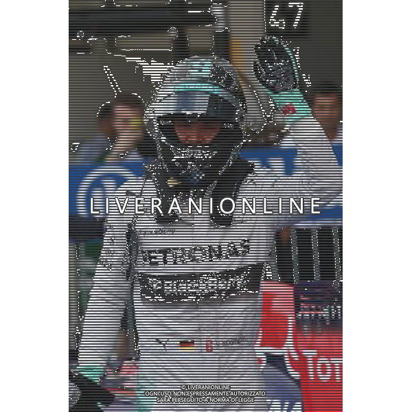 Pole for Nico Rosberg (GER) Mercedes AMG F1 W05. 04.10.2014. Formula 1 World Championship, Rd 15, Japanese Grand Prix, Suzuka, Japan, Qualifying Day. - www.xpbimages.com, EMail: requests@xpbimages.com - copy of publication required for printed pictures. Every used picture is fee-liable. © Copyright: Batchelor / XPB Images /Ag. Aldo Liverani s.a.s.-Only Italy-Editorial Use Only