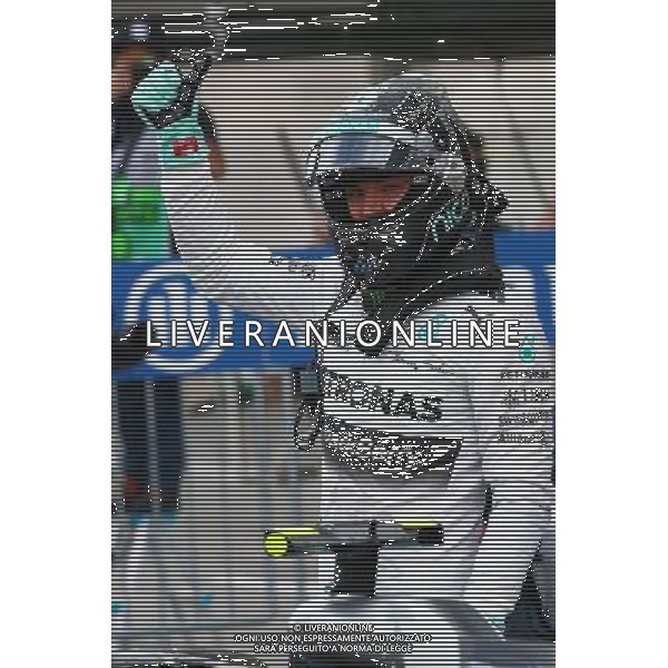 Pole for Nico Rosberg (GER) Mercedes AMG F1 W05. 04.10.2014. Formula 1 World Championship, Rd 15, Japanese Grand Prix, Suzuka, Japan, Qualifying Day. - www.xpbimages.com, EMail: requests@xpbimages.com - copy of publication required for printed pictures. Every used picture is fee-liable. © Copyright: Batchelor / XPB Images /Ag. Aldo Liverani s.a.s.-Only Italy-Editorial Use Only