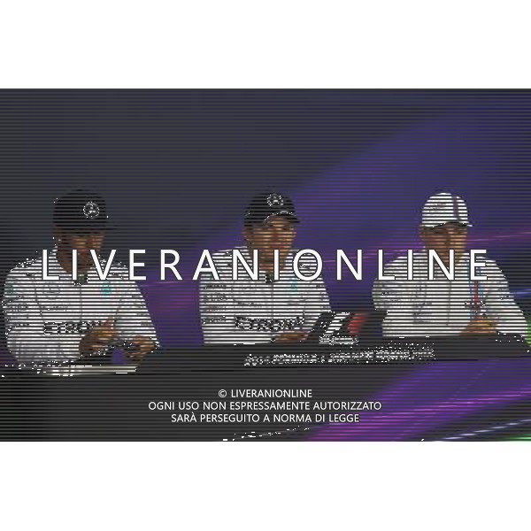 The FIA Press Conference Qualifying top three (L to R): Lewis Hamilton (GBR) Mercedes AMG F1, second; Nico Rosberg (GER) Mercedes AMG F1, pole position; Valtteri Bottas (FIN) Williams, third. 04.10.2014. Formula 1 World Championship, Rd 15, Japanese Grand Prix, Suzuka, Japan, Qualifying Day. - www.xpbimages.com, EMail: requests@xpbimages.com - copy of publication required for printed pictures. Every used picture is fee-liable. © Copyright: Moy / XPB Images /Ag. Aldo Liverani s.a.s.-Only Italy-Editorial Use Only
