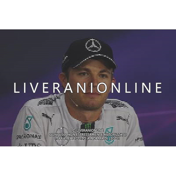 Nico Rosberg (GER) Mercedes AMG F1 in the FIA Press Conference. 04.10.2014. Formula 1 World Championship, Rd 15, Japanese Grand Prix, Suzuka, Japan, Qualifying Day. - www.xpbimages.com, EMail: requests@xpbimages.com - copy of publication required for printed pictures. Every used picture is fee-liable. © Copyright: Moy / XPB Images /Ag. Aldo Liverani s.a.s.-Only Italy-Editorial Use Only