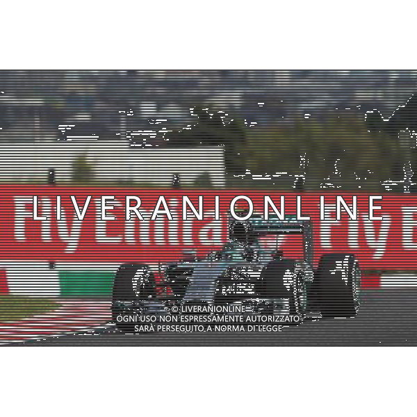 Nico Rosberg (GER) Mercedes AMG F1 W05. 04.10.2014. Formula 1 World Championship, Rd 15, Japanese Grand Prix, Suzuka, Japan, Qualifying Day. - www.xpbimages.com, EMail: requests@xpbimages.com - copy of publication required for printed pictures. Every used picture is fee-liable. © Copyright: Photo4 / XPB Images /Ag. Aldo Liverani s.a.s.-Only Italy-Editorial Use Only