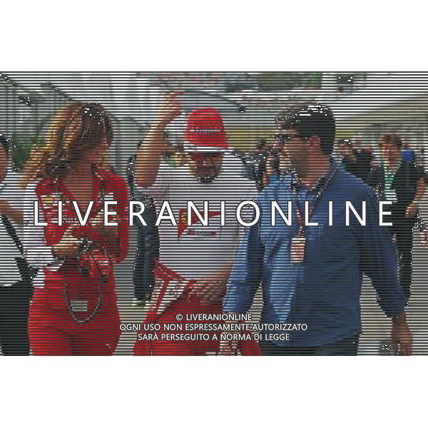 (L to R): Roberta Vallorosi (ITA) Ferrari Press Officer with Fernando Alonso (ESP) Ferrari and Luis Garcia Abad (ESP) Driver Manager. 04.10.2014. Formula 1 World Championship, Rd 15, Japanese Grand Prix, Suzuka, Japan, Qualifying Day. - www.xpbimages.com, EMail: requests@xpbimages.com - copy of publication required for printed pictures. Every used picture is fee-liable. © Copyright: Photo4 / XPB Images /Ag. Aldo Liverani s.a.s.-Only Italy-Editorial Use Only