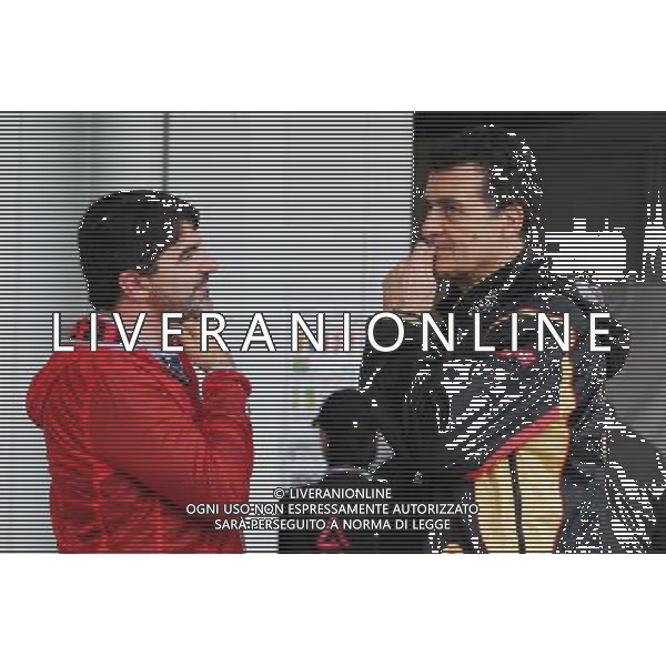 (L to R): Luis Garcia Abad (ESP) Driver Manager of Fernando Alonso (ESP) Ferrari with Federico Gastaldi (ARG) Lotus F1 Team Deputy Team Principal. 05.10.2014. Formula 1 World Championship, Rd 15, Japanese Grand Prix, Suzuka, Japan, Race Day. 