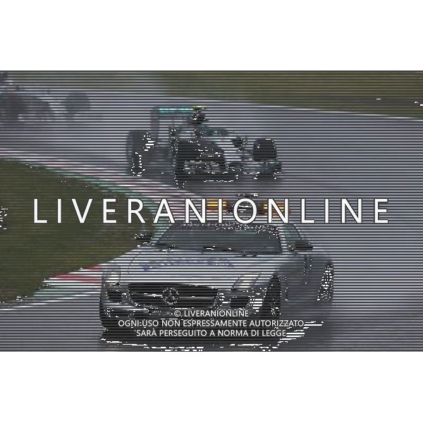 Nico Rosberg (GER) Mercedes AMG F1 W05 leads behind the FIA Safety Car. 05.10.2014. Formula 1 World Championship, Rd 15, Japanese Grand Prix, Suzuka, Japan, Race Day. 