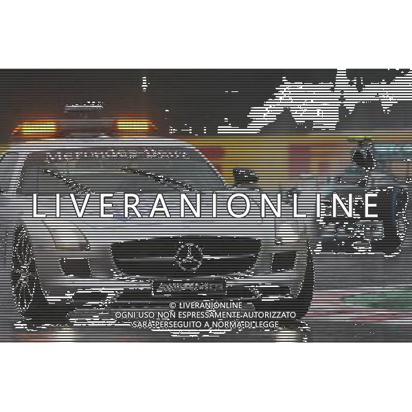 Nico Rosberg (GER) Mercedes AMG F1 W05 leads behind the FIA Safety Car. 05.10.2014. Formula 1 World Championship, Rd 15, Japanese Grand Prix, Suzuka, Japan, Race Day. 