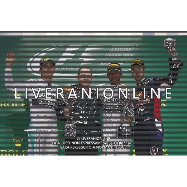 1st place for Lewis Hamilton (GBR) Mercedes AMG F1, 2nd for Nico Rosberg (GER) Mercedes AMG F1 W05 and 3rd for Sebastian Vettel (GER) Red Bull Racing. 05.10.2014. Formula 1 World Championship, Rd 15, Japanese Grand Prix, Suzuka, Japan, Race Day. 