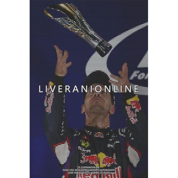 2nd place Sebastian Vettel (GER) Red Bull Racing RB10. 21.09.2014. Formula 1 World Championship, Rd 14, Singapore Grand Prix, Singapore, Singapore, Race Day. 