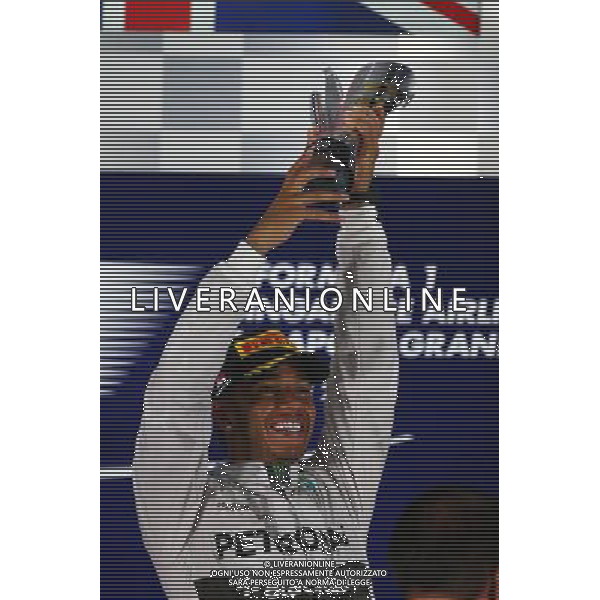 1st place Lewis Hamilton (GBR) Mercedes AMG F1. 21.09.2014. Formula 1 World Championship, Rd 14, Singapore Grand Prix, Singapore, Singapore, Race Day. 