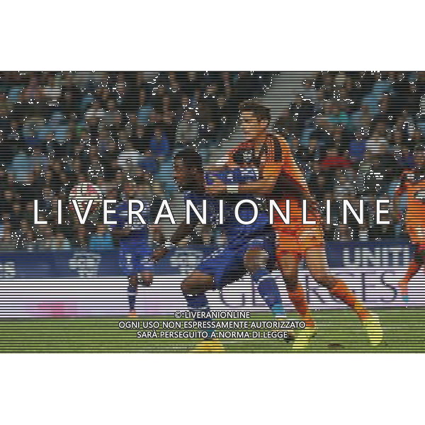 Junior TALLO / Fabrice BELLUGOU - 04.10.2014 - Bastia / Lorient - 9eme journee de Ligue 1 Photo : Michel Maestracci / Icon Sport AG ALDO LIVERANI SAS ONLY ITALY