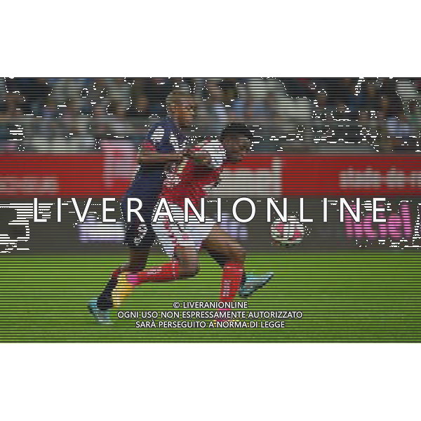 Benjamin MOUKANDJO / Diego ROLAN - 03.10.2014 - Reims / Bordeaux - 9eme journee de Ligue 1 Photo : Dave Winter / Icon Sport AG ALDO LIVERANI SAS ONLY ITALY