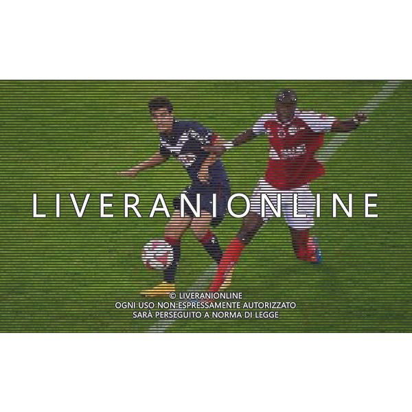 Younes KAABOUNI / Prince ONIANGUE - 03.10.2014 - Reims / Bordeaux - 9eme journee de Ligue 1 Photo : Dave Winter / Icon Sport AG ALDO LIVERANI SAS ONLY ITALY
