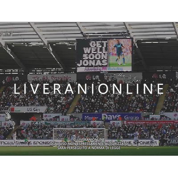 a message to \'get well soon\' aimed towards Newcastle United\'s Jonas Gutierrez during the game Photographer Ashley Crowden/CameraSport Football - Barclays Premiership - Swansea City v Newcastle United - Saturday 04th October 2014 - Liberty Stadium - Swansea © CameraSport - 43 Linden Ave. Countesthorpe. Leicester. England. LE8 5PG - Tel: +44 (0) 116 277 4147 - admin@camerasport.com - www.camerasport.com