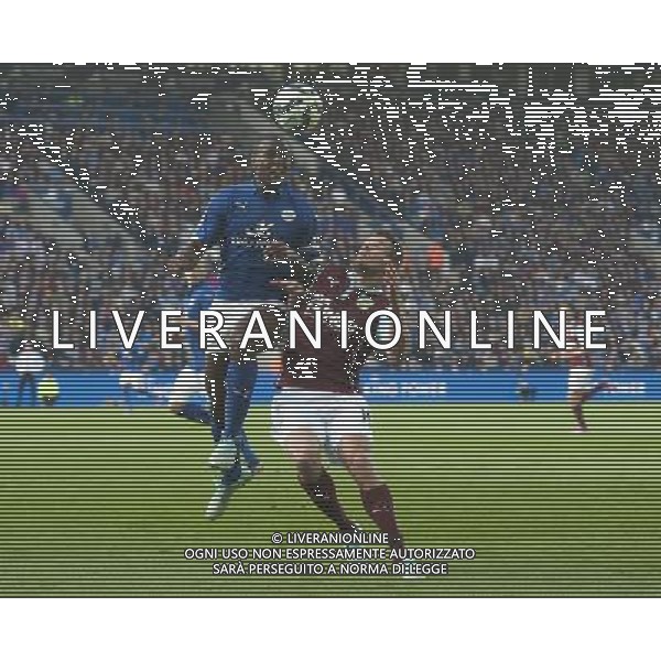 Leicester City\'s Wes Morgan battles with Burnley\'s Lukas Jutkiewicz Photographer Stephen White/CameraSport Football - Barclays Premiership - Leicester City v Burnley - Saturday 04th October 2014 - King Power Stadium - Leicester © CameraSport - 43 Linden Ave. Countesthorpe. Leicester. England. LE8 5PG - Tel: +44 (0) 116 277 4147 - admin@camerasport.com - www.camerasport.com AG ALDO LIVERANI SAS ONLY ITALY