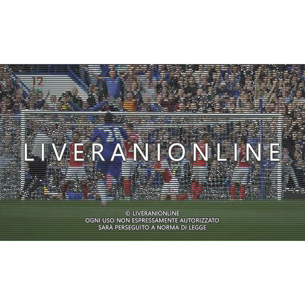 Referee Martin Atkinson awards a penalty after Arsenal\'s Laurent Koscielny brings down Eden Hazard Photographer Ashley Western/CameraSport Football - Barclays Premiership - Chelsea v Arsenal - Sunday 05th October 2014 - Stamford Bridge - London © CameraSport - 43 Linden Ave. Countesthorpe. Leicester. England. LE8 5PG - Tel: +44 (0) 116 277 4147 - admin@camerasport.com - www.camerasport.com AG ALDO LIVERANI SAS ONLY ITALY