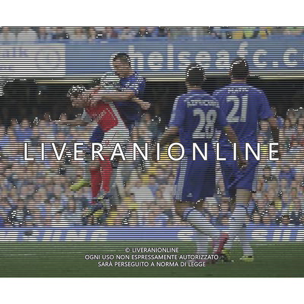 Chelsea\'s John Terry battles with Arsenal\'s Santi Cazorla Photographer Ashley Western/CameraSport Football - Barclays Premiership - Chelsea v Arsenal - Sunday 05th October 2014 - Stamford Bridge - London © CameraSport - 43 Linden Ave. Countesthorpe. Leicester. England. LE8 5PG - Tel: +44 (0) 116 277 4147 - admin@camerasport.com - www.camerasport.com AG ALDO LIVERANI SAS ONLY ITALY