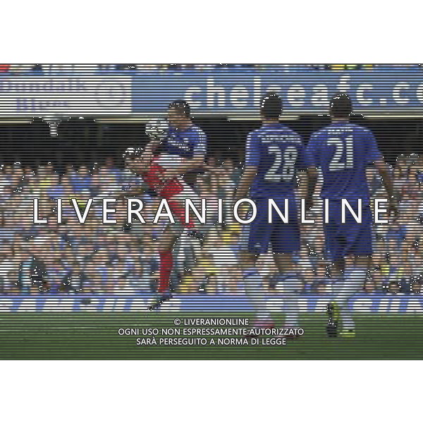 Chelsea\'s John Terry battles with Arsenal\'s Santi Cazorla Photographer Ashley Western/CameraSport Football - Barclays Premiership - Chelsea v Arsenal - Sunday 05th October 2014 - Stamford Bridge - London © CameraSport - 43 Linden Ave. Countesthorpe. Leicester. England. LE8 5PG - Tel: +44 (0) 116 277 4147 - admin@camerasport.com - www.camerasport.com AG ALDO LIVERANI SAS ONLY ITALY