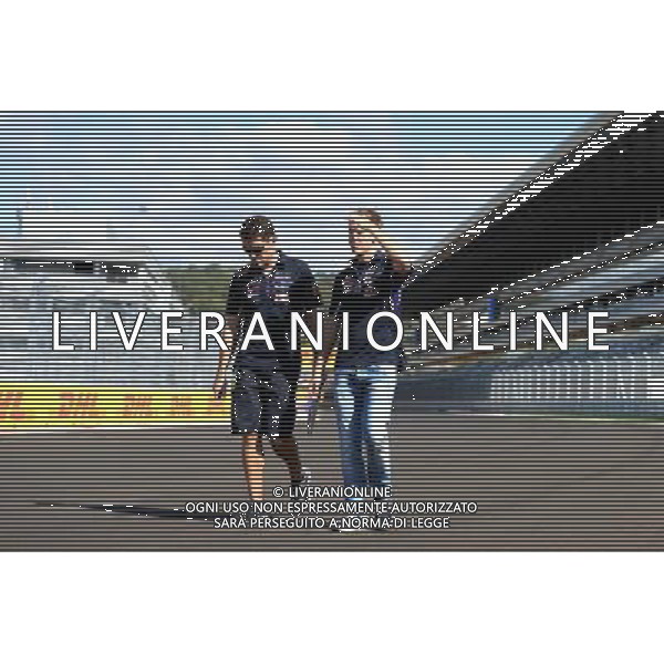 Sebastian Vettel (GER) Red Bull Racing walks the circuit with Guillaume Rocquelin (ITA) Red Bull Racing Race Engineer. 09.10.2014. Formula 1 World Championship, Rd 16, Russian Grand Prix, Sochi Autodrom, Sochi, Russia, Preparation Day. AG ALDO LIVERANI SAS ONLY ITALY