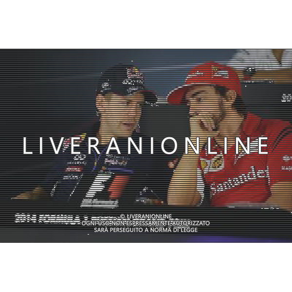 (L to R): Sebastian Vettel (GER) Red Bull Racing and Fernando Alonso (ESP) Ferrari in the FIA Press Conference. 09.10.2014. Formula 1 World Championship, Rd 16, Russian Grand Prix, Sochi Autodrom, Sochi, Russia, Preparation Day. - www.xpbimages.com, EMail: requests@xpbimages.com - copy of publication required for printed pictures. Every used picture is fee-liable. © Copyright: Price / XPB Images