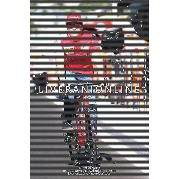 Kimi Raikkonen (FIN) Ferrari on his bicycle. 09.10.2014. Formula 1 World Championship, Rd 16, Russian Grand Prix, Sochi Autodrom, Sochi, Russia, Preparation Day. - www.xpbimages.com, EMail: requests@xpbimages.com - copy of publication required for printed pictures. Every used picture is fee-liable. © Copyright: Batchelor / XPB Images