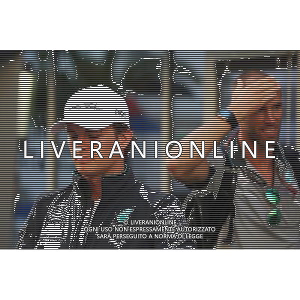 (L to R): Nico Rosberg (GER) Mercedes AMG F1 with Daniel Schloesser (GER) Mercedes AMG F1 Physio. 09.10.2014. Formula 1 World Championship, Rd 16, Russian Grand Prix, Sochi Autodrom, Sochi, Russia, Preparation Day. - www.xpbimages.com, EMail: requests@xpbimages.com - copy of publication required for printed pictures. Every used picture is fee-liable. © Copyright: Photo4 / XPB Images