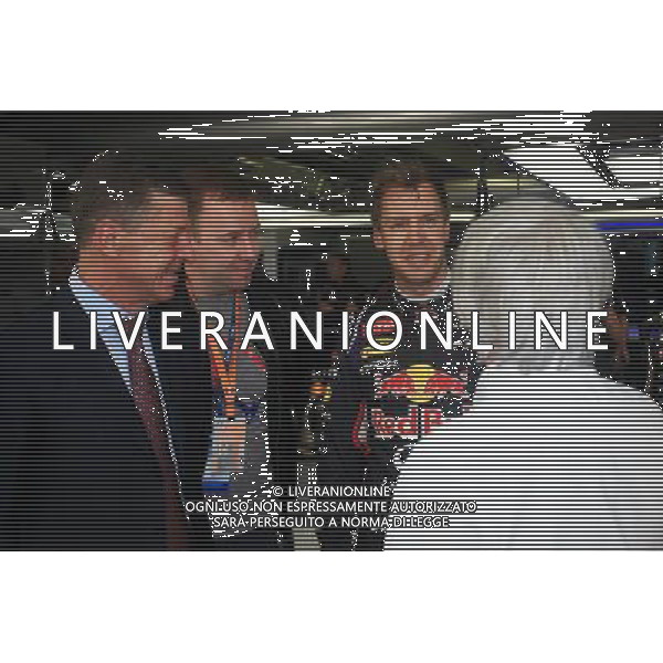 (L to R): Dmitry Kozak (RUS) Russian Deputy Prime Minister with Sebastian Vettel (GER) Red Bull Racing and Bernie Ecclestone (GBR). 10.10.2014. Formula 1 World Championship, Rd 16, Russian Grand Prix, Sochi Autodrom, Sochi, Russia, Practice Day. AG ALDO LIVERANI SAS ONLY ITALY