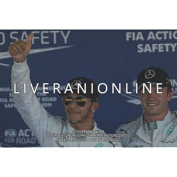 Lewis Hamilton (GBR), Mercedes AMG F1 Team and Nico Rosberg (GER), Mercedes AMG F1 Team 11.10.2014. Formula 1 World Championship, Rd 16, Russian Grand Prix, Sochi Autodrom, Sochi, Russia, Qualifying Day. - www.xpbimages.com, EMail: requests@xpbimages.com - copy of publication required for printed pictures. Every used picture is fee-liable. © Copyright: Charniaux / XPB Images /AGENZIA ALDO LIVERANI SAS - ITALY ONLY - EDITORIAL USE ONLY - Gp F1 Sochi Russia prove ufficiali
